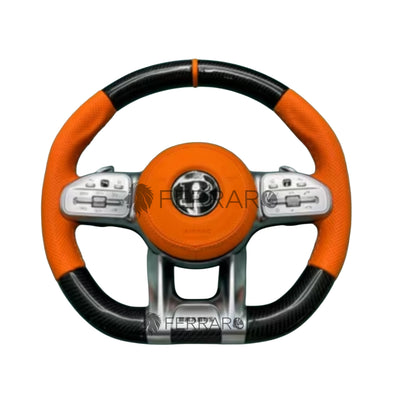 (PRENOTA) Volante per Mercedes, Carbonio Diagonale, Etichetta Arancione, Filo Arancione, Perforato, Galvanica, Brabus